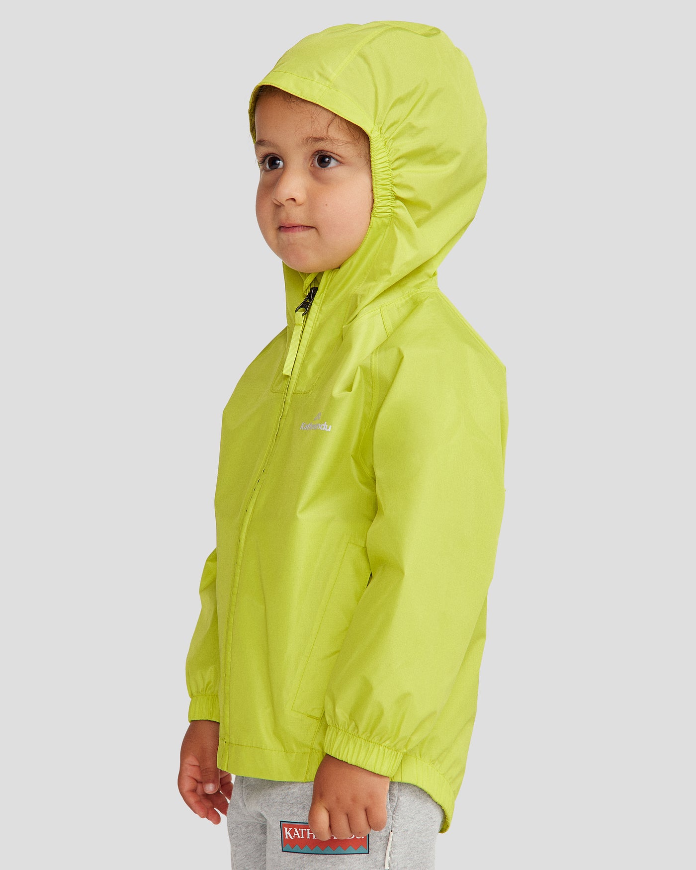 a1394_olg_pocket_it_2l_kids_rain_jacket_v4_green_m_c_1745458714000