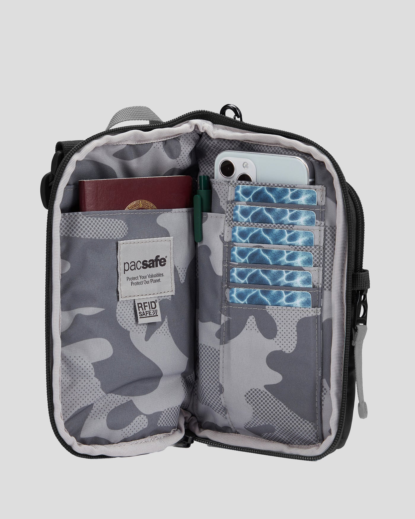 b1933_owe_pacsafe_go_tech_crossbody_f_1784780710000